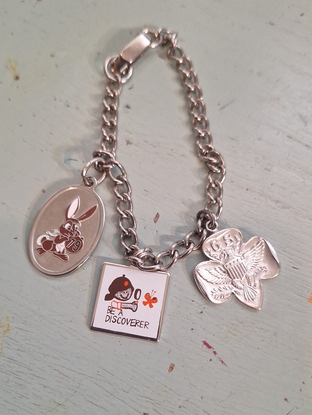 Silver Kids Charm Bracelet with Girl Scout Explorer Charms.